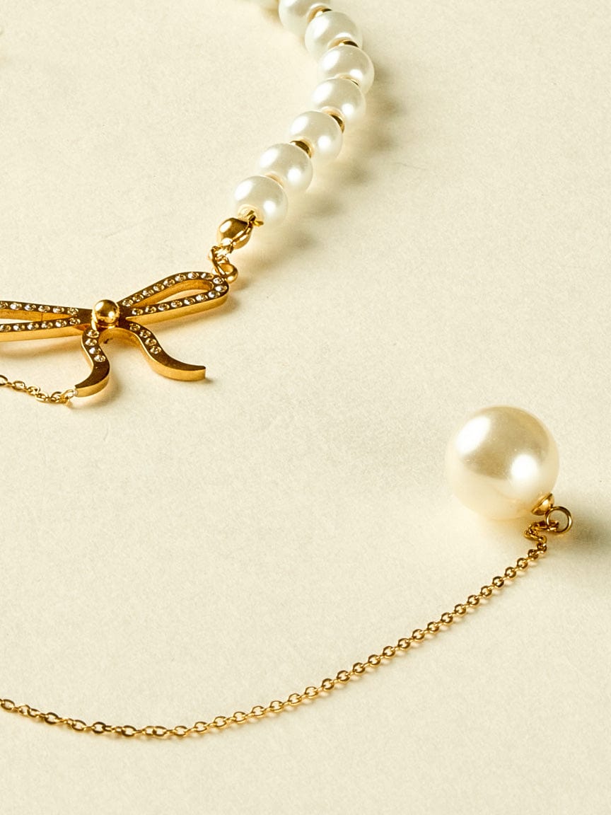 Gold Ribbon Pearl Necklace