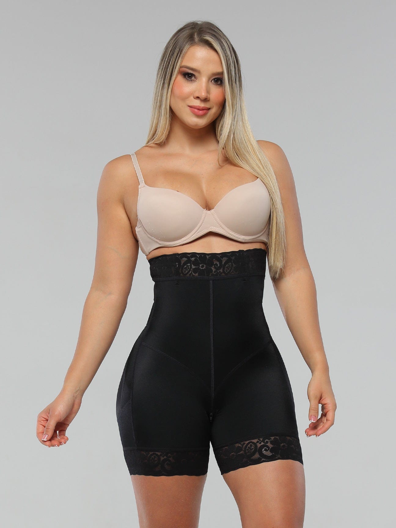 Black Colombian strapless faja shapewear bodysuit with high-waist compression and smooth mid-thigh support, front view