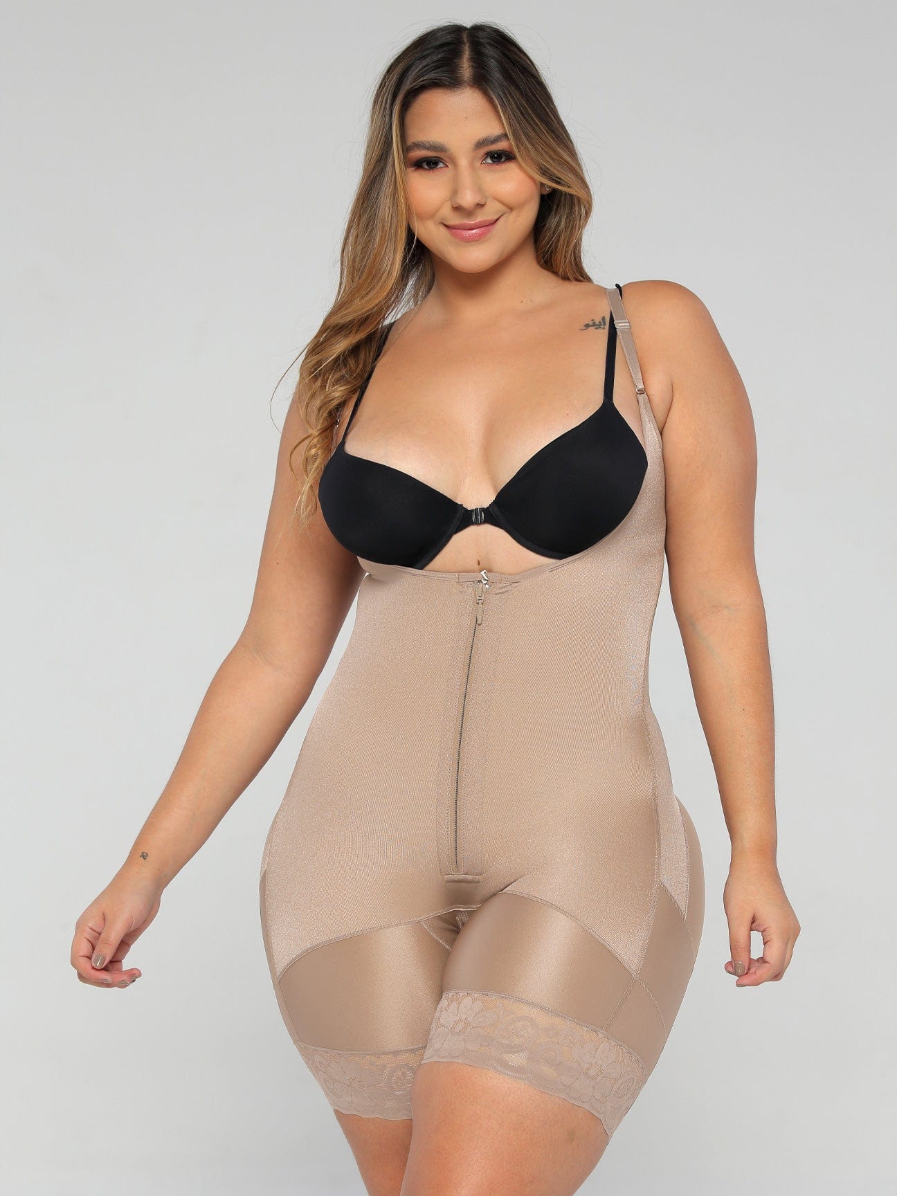 Beige Colombian faja shapewear with zipper and light compression, front view