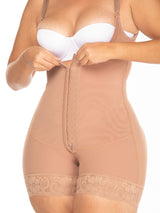 Nude Colombian shapewear bodysuit with adjustable hook-and-eye closure and firm waist compression, close-up view