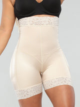 Beige Colombian strapless faja shapewear with high-waist compression and smooth mid-thigh support, front view