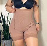 Nude Colombian shapewear shorts with high-waist compression and smooth mid-thigh support, front view