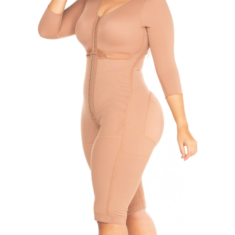 Beige colored full body faja similar to a bodysuit with long sleeves.