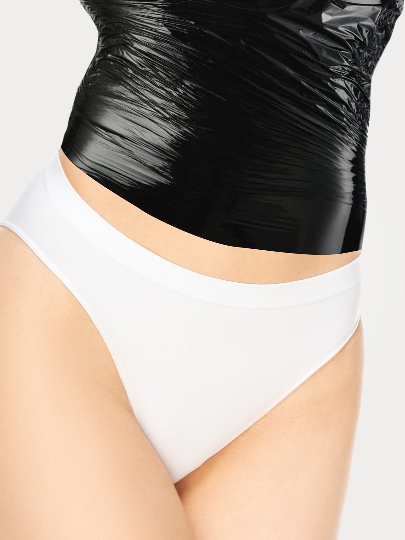 Black osmotic waist wrap roll designed for body slimming and compression