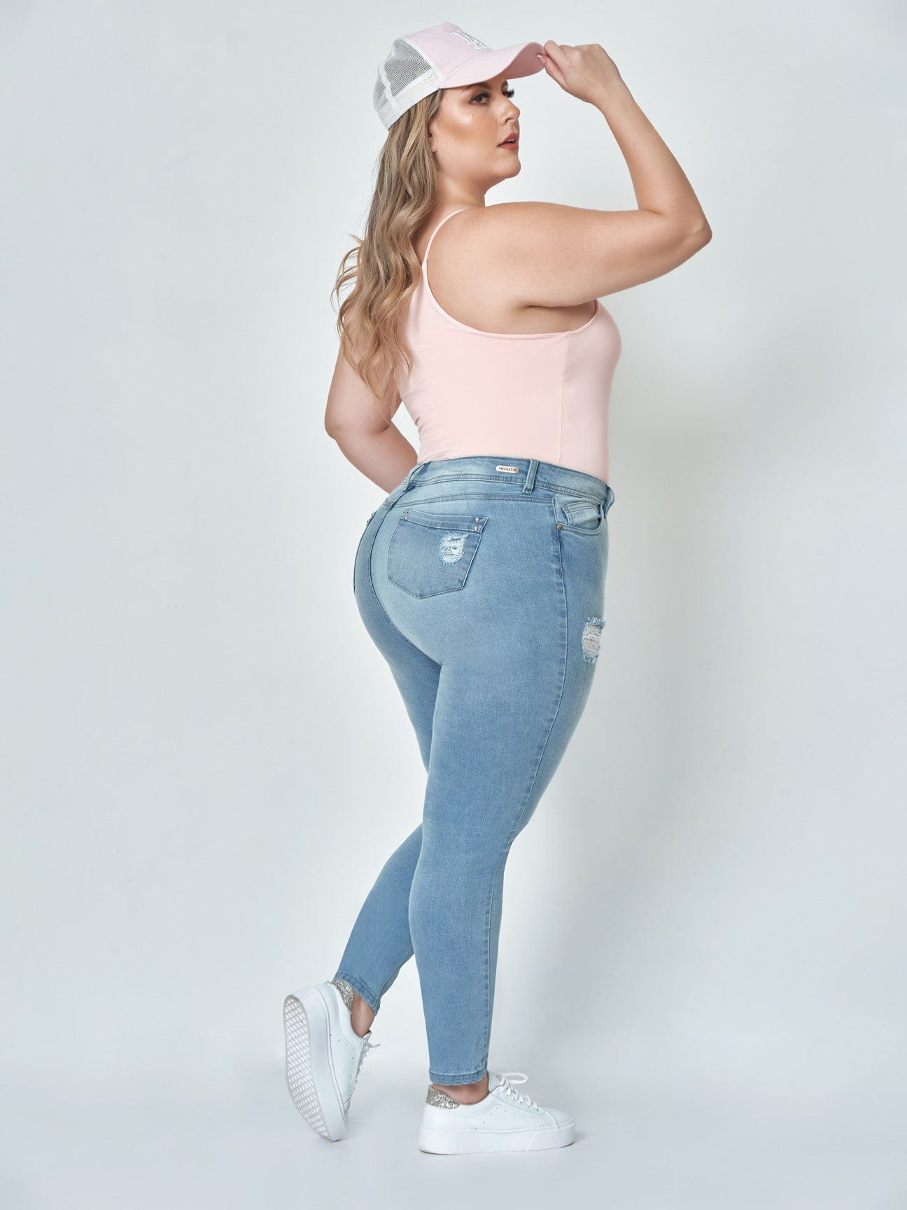 Hannah Butt Lift Stretch Skinny Jeans full body side back view plus sized model.