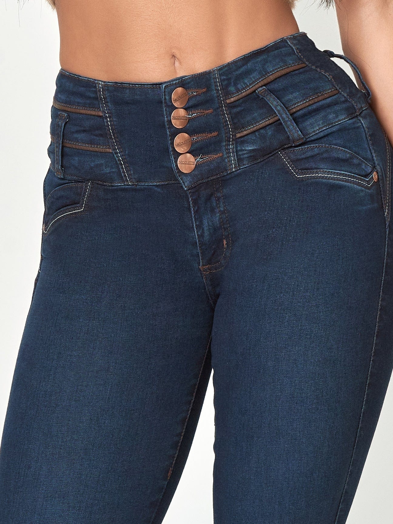 Mia High Rise Skinny Jeans front waist view.