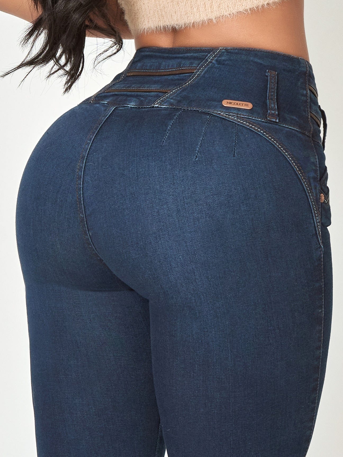 Mia High Rise Skinny Jeans back waist view.
