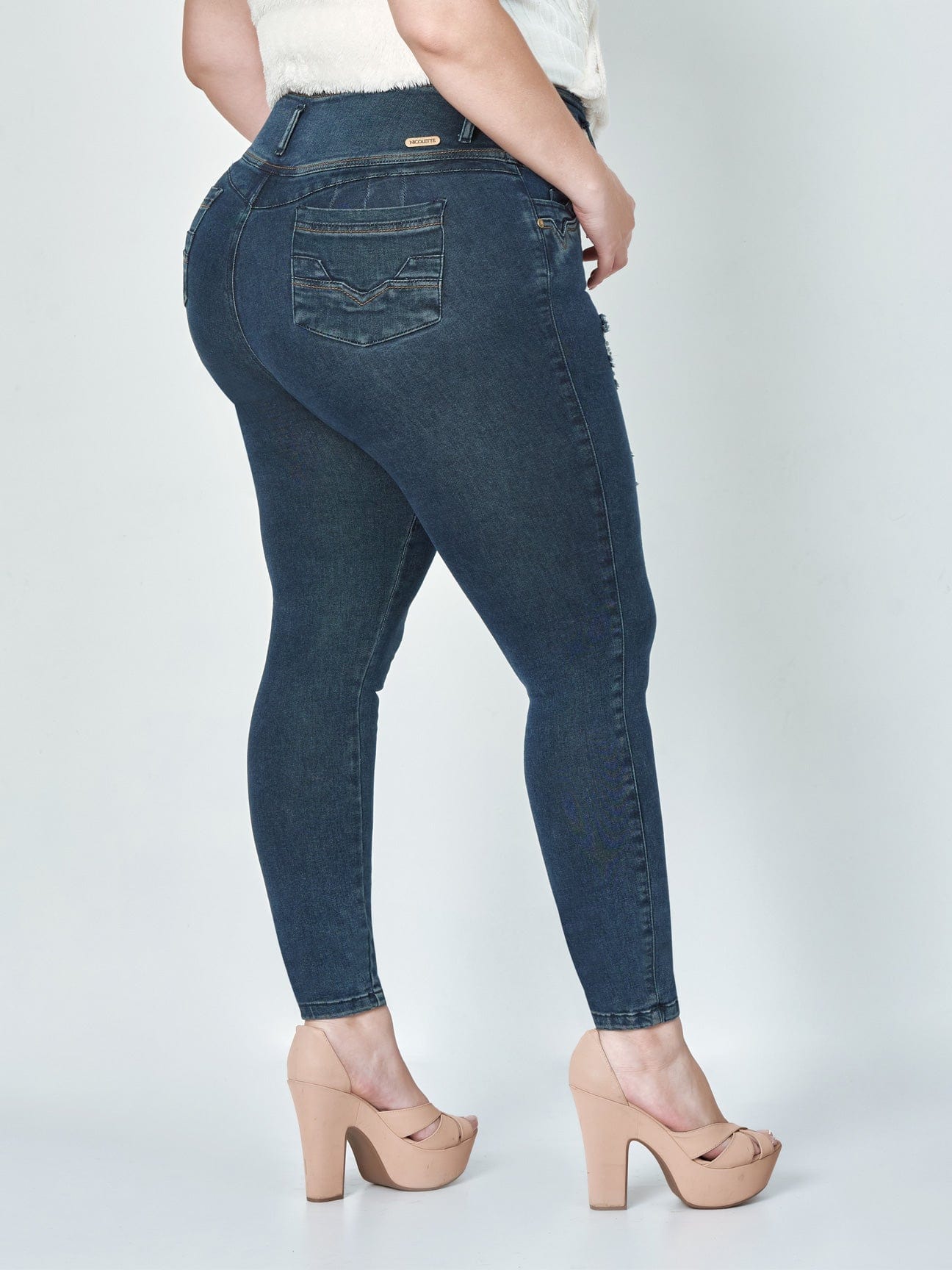 Sasha Butt Lift Dark Blue Ripped Skinny Jeans lower body back view.