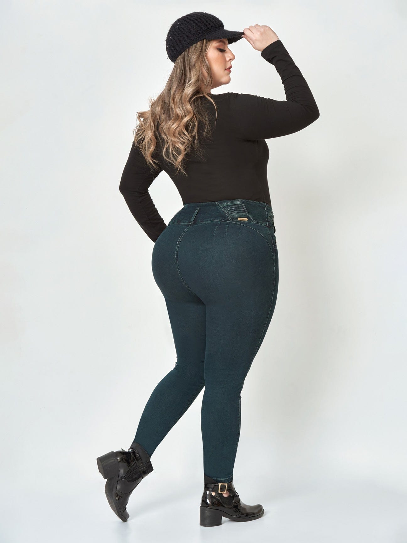 Gwen Butt Lift Skinny Blue Jeans full body back view plus sized model.