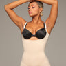 Full view of the beige invisible body suit with panty.