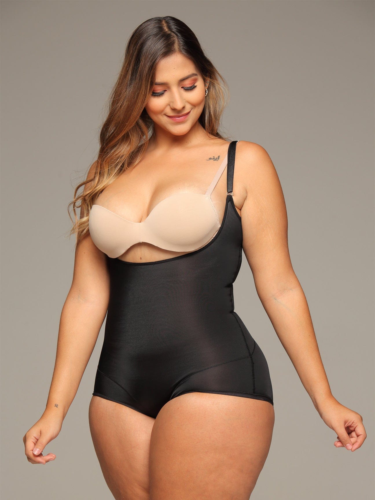 Full view of the black invisible body suit with panty.