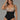 Full front view of black Tummy Smoothing Faja Bodysuit with plus sized model.