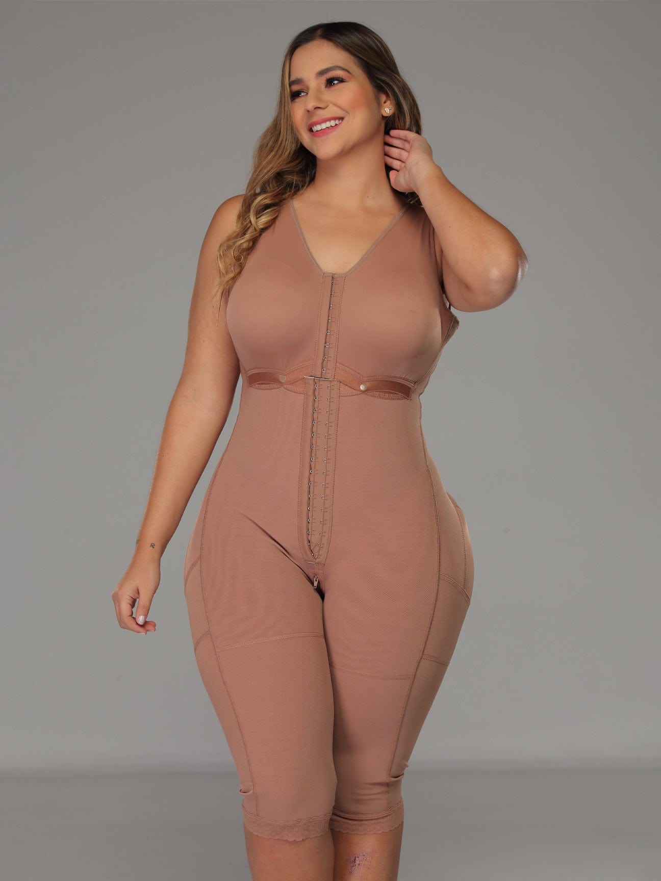 Mocha Colombian shapewear bodysuit with built-in bra and adjustable hook-and-eye closure, front view