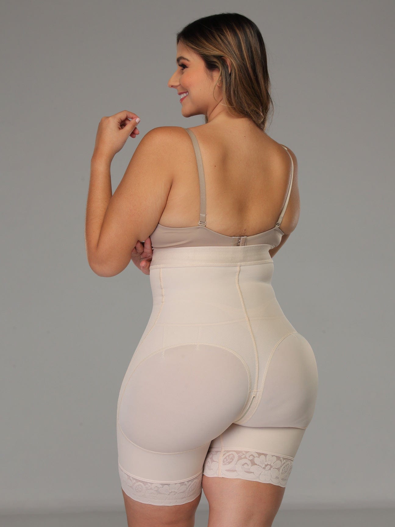 Strapless Powernet Hourglass Body Shaper with Butt Lift beige color back view plus sized model.