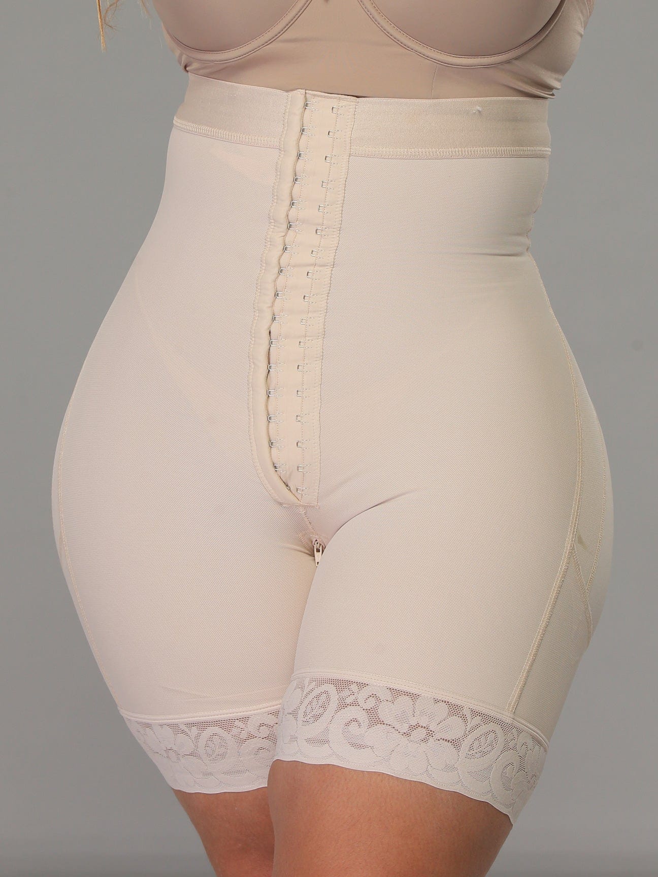 Strapless Powernet Hourglass Body Shaper with Butt Lift waist view beige color.