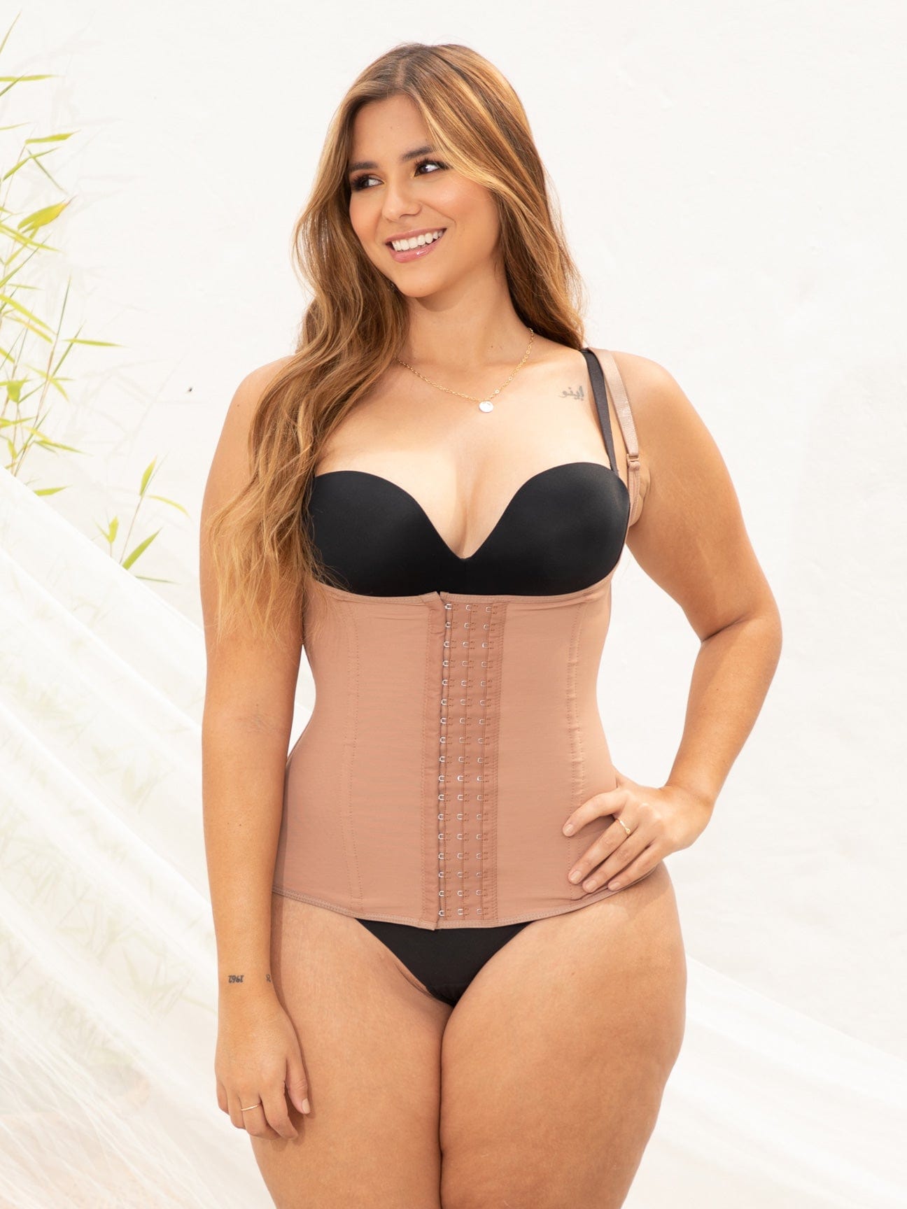 Nude Colombian faja waist trainer with adjustable straps and high compression, front view