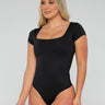 Black Shapewear Bodysuit with Tummy Control full body front view.