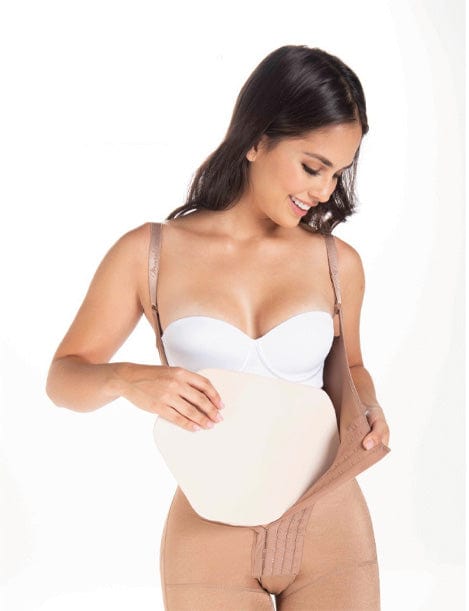 Woman wearing post-surgical abdominal board with high-waisted compression garment